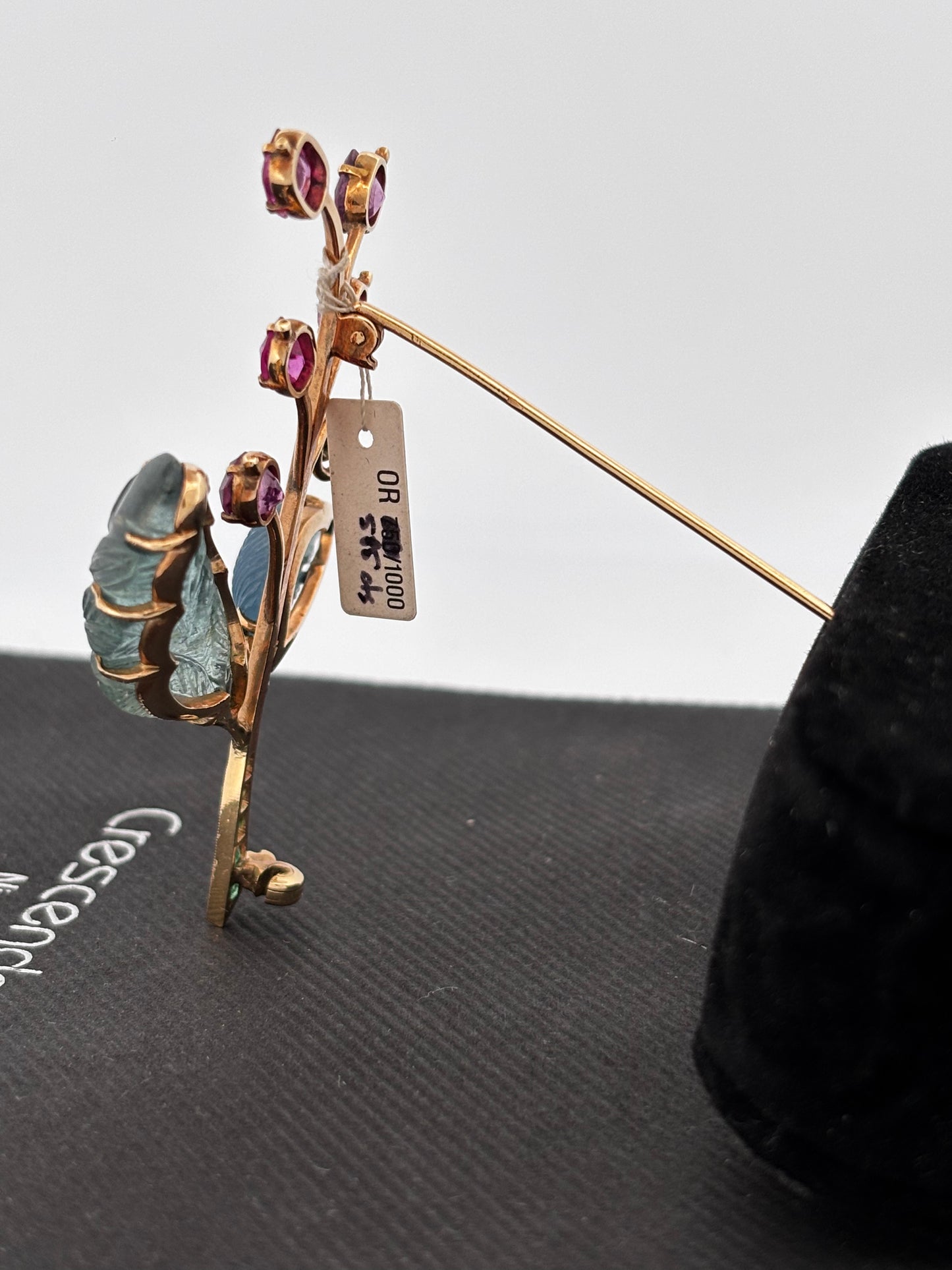 Broche gold rubi eme