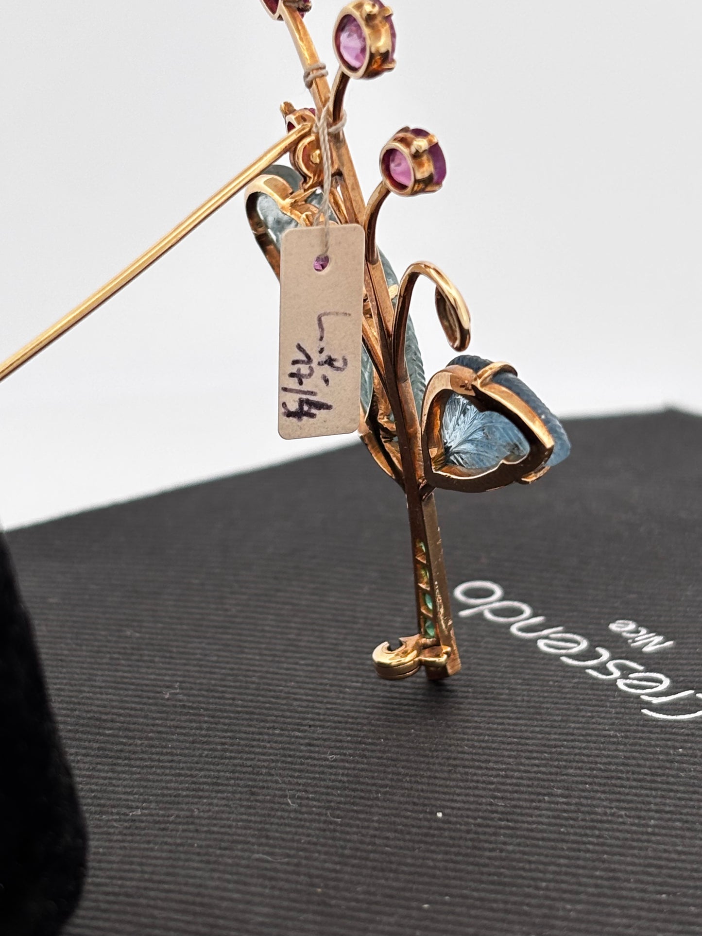 Broche gold rubi eme