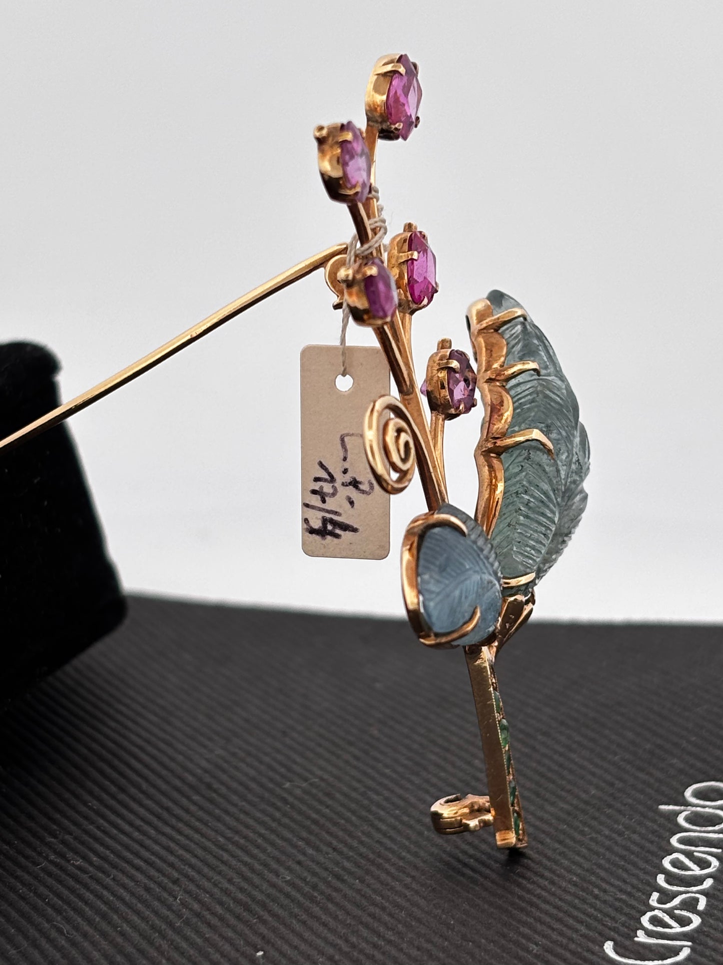 Broche gold rubi eme