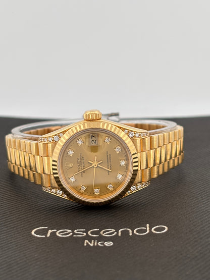 ROLEX – Lady-Datejust | Or jaune 18K | Cadran champagne diamants | Bracelet Président