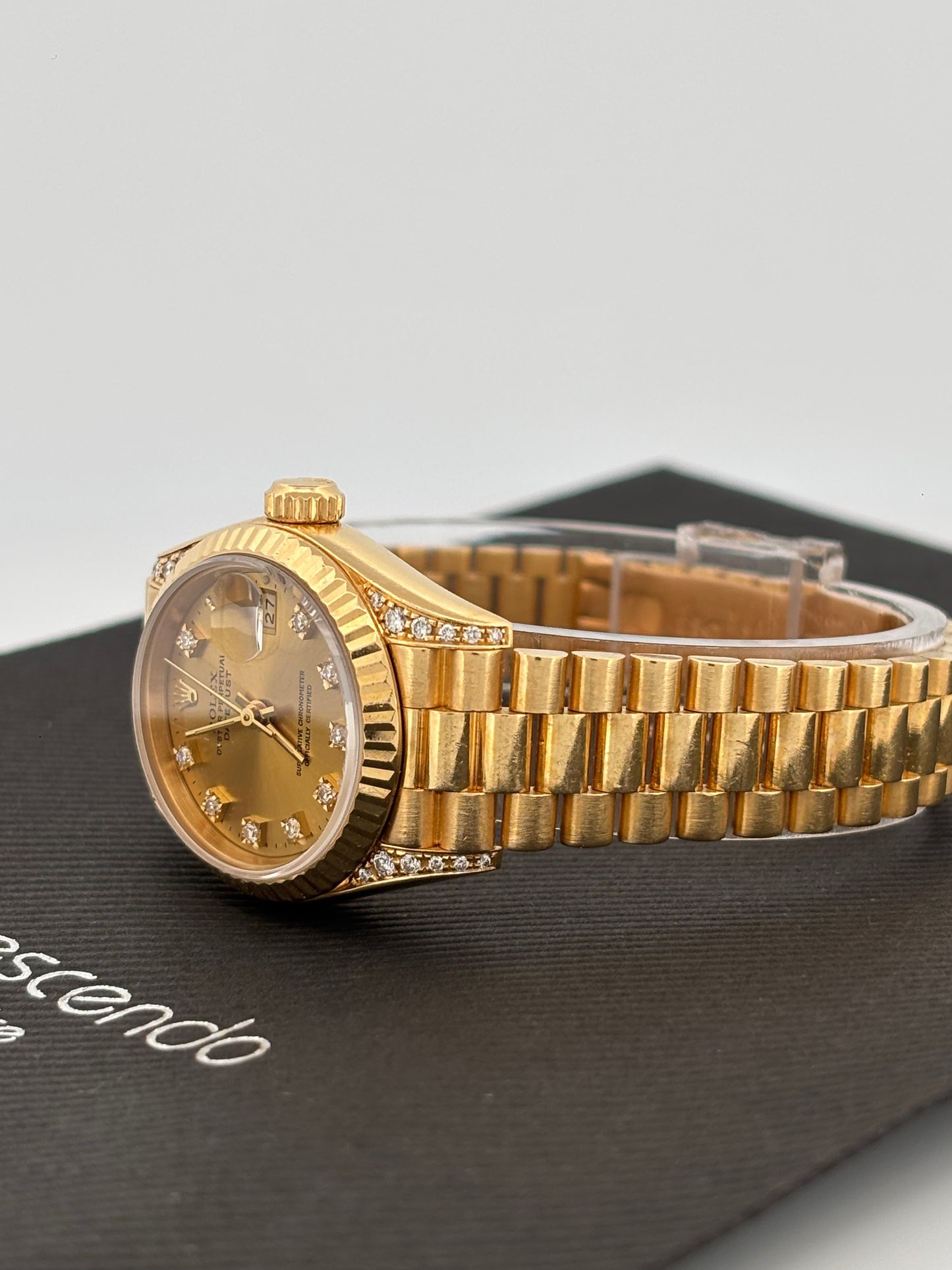 ROLEX – Lady-Datejust | Or jaune 18K | Cadran champagne diamants | Bracelet Président