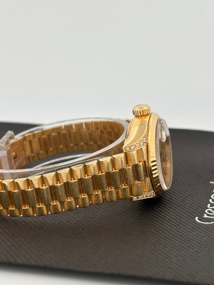 ROLEX – Lady-Datejust | Or jaune 18K | Cadran champagne diamants | Bracelet Président