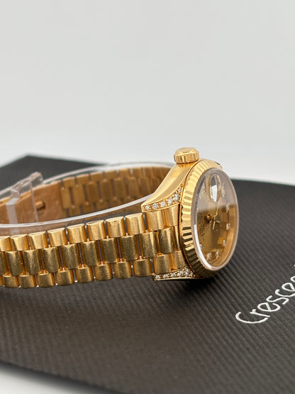 ROLEX – Lady-Datejust | Or jaune 18K | Cadran champagne diamants | Bracelet Président