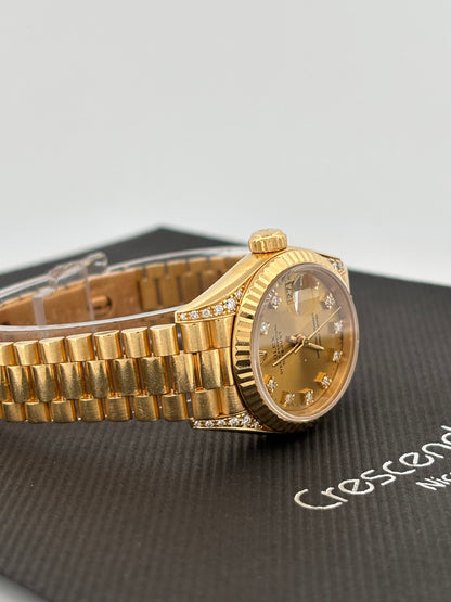 ROLEX – Lady-Datejust | Or jaune 18K | Cadran champagne diamants | Bracelet Président