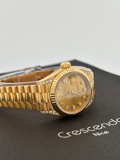 ROLEX – Lady-Datejust | Or jaune 18K | Cadran champagne diamants | Bracelet Président