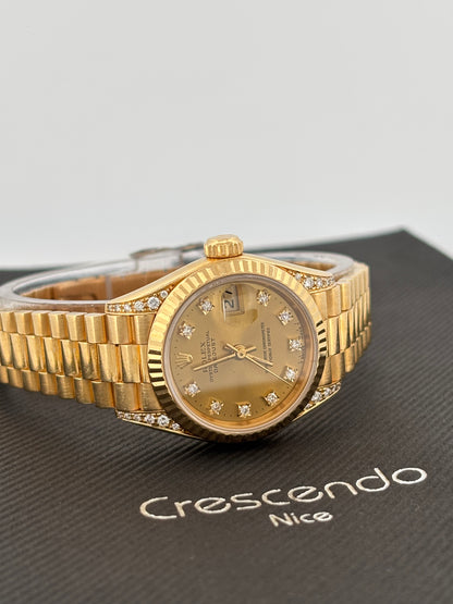 ROLEX – Lady-Datejust | Or jaune 18K | Cadran champagne diamants | Bracelet Président
