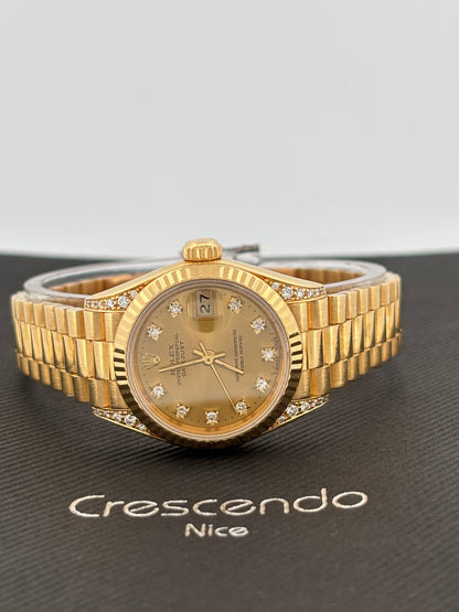 ROLEX – Lady-Datejust | Or jaune 18K | Cadran champagne diamants | Bracelet Président