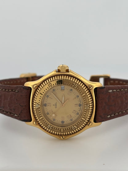 EBEL – Discovery | Or jaune | Quartz | Cuir | Lunette tournante