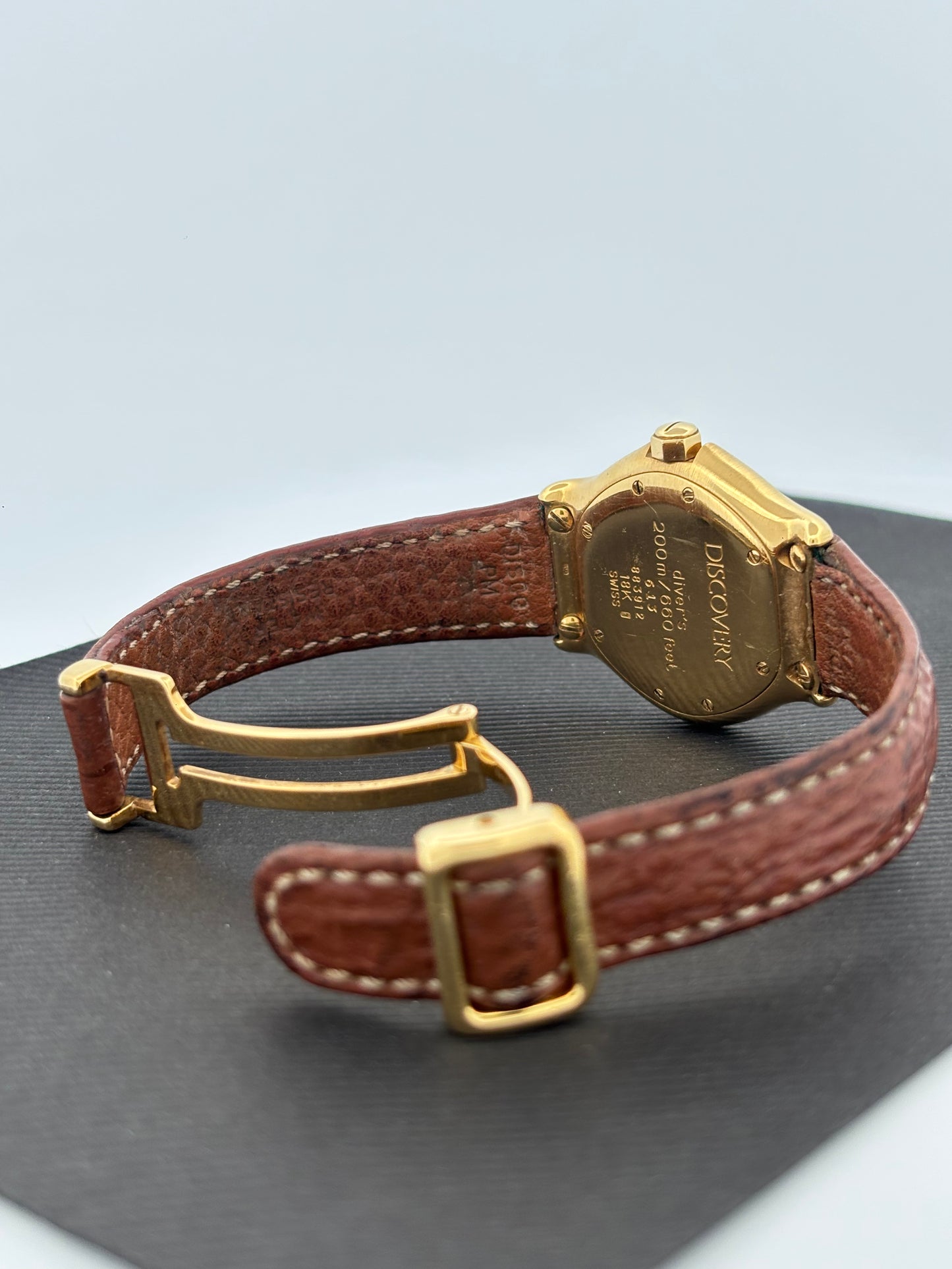 EBEL – Discovery | Or jaune | Quartz | Cuir | Lunette tournante