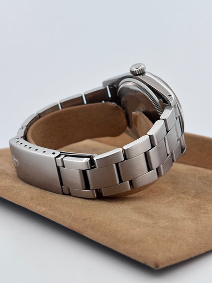 ROLEX – Oyster Perpetual Date 34 mm | Acier | Oyster | Automatique | Circa début années 1990