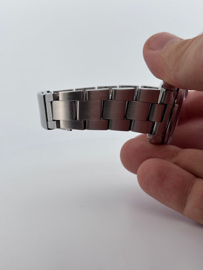 ROLEX – Oyster Perpetual Date 34 mm | Acier | Oyster | Automatique | Circa début années 1990